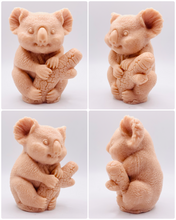 Load image into Gallery viewer, Handmade vegan soaps featuring a chunky koala bear climbing a tree packaged in beautiful eco friendly packaging crafted with natural French clays, activated charcoal and essential oils. a eco-friendly, zero waste gift that’s cruelty-free, skin-nourishing, and perfect for koala bear lovers and animal themed gifts. small business UK