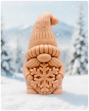 Load image into Gallery viewer, Handmade vegan soaps featuring a christmas gnome holding a snowflake in beautiful eco friendly packaging crafted with natural French clays, activated charcoal and essential oils. a eco-friendly, zero waste gift that’s cruelty-free, skin-nourishing, and perfect for gnome lovers and christmas themed gifts. small business UK