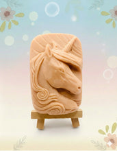 Load image into Gallery viewer, Handmade vegan soaps featuring a unicorn head and wrapped in beautiful eco friendly packaging crafted with natural French clays, activated charcoal and essential oils. a eco-friendly, zero waste gift that’s cruelty-free, skin-nourishing, and perfect gift for unicorn lovers. small business UK
