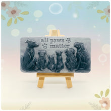 Load image into Gallery viewer, dog lover gift. cat lover gift. animal lover gift. zero waste gift. modern gifts. handmade home style. This beautifully detailed, chunky bar features a line-up of our loyal four-legged friends, reminding us of the love, joy, and muddy footprints they bring into our lives. The one in the photo is made with charcoal and lavender essential oil, soothing, earthy, and perfect for washing the day away (or after a long dog walk!). eco conscious home. eco conscious living.