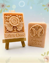 Load image into Gallery viewer, Handmade vegan soaps featuring a set of two positive quote soaps, gift boxed in beautiful eco friendly packaging. embrace your dreams and life’s good wording. crafted with natural French clays, activated charcoal and essential oils. a eco-friendly, zero waste gift that’s cruelty-free, skin-nourishing, and perfect for birthday gifts and friendship gifts. Small Business UK