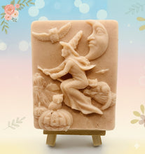 Load image into Gallery viewer, Handmade vegan soaps featuring a witch flying on her broomstick. crafted with natural French clays, activated charcoal and essential oils. a eco-friendly, zero waste gift thatās cruelty-free, skin-nourishing, and perfect for witch gifts and Halloween gifts. Small business UK