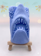 Load image into Gallery viewer, Handmade vegan soaps featuring a shark with his mouth open and jagged teeth showing . gift boxed in beautiful eco friendly packaging. crafted with natural French clays, activated charcoal and essential oils. a eco-friendly, zero waste gift that’s cruelty-free, skin-nourishing, the perfect gift for shark lovers and animal lovers. UK Small Business