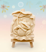 Load image into Gallery viewer, Frog Gift | cute frog gift | unique frog gift,Stocking filler, Frog & Lily Pad Vegan Soap Wooden display easels are available to purchase on a separate listing Meet our adorable Frog & Lilypad soap! This charming little frog holds a lilypad leaf over his head like a tiny umbrella, hiding from the sun and ready to brighten up your day! modern gifts. handmade home style. eco conscious gifts. zero waste gift. handmade home style. modern gift ideas.