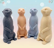 Load image into Gallery viewer, Handmade vegan soaps featuring a cheeky meerkat standing on his back legs. packaged in beautiful eco friendly packaging crafted with natural French clays, activated charcoal and essential oils. a eco-friendly, zero waste gift that’s cruelty-free, skin-nourishing, and perfect for meerkat lovers and animal themed gifts. small business UK