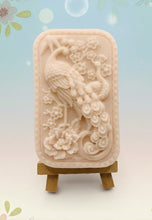 Load image into Gallery viewer, Handmade vegan soaps featuring a detailed peacock, in beautiful eco friendly packaging. crafted with natural French clays, activated charcoal and essential oils. a eco-friendly, zero waste gift that’s cruelty-free, skin-nourishing, the perfect gift for peacock lovers or for animal lovers. small business UK