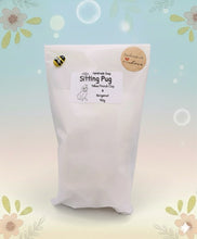 Load image into Gallery viewer, Handmade vegan soaps featuring a cute sitting pug dog. crafted with natural French clays, activated charcoal and essential oils. a eco-friendly, zero waste gift that’s cruelty-free, skin-nourishing, and perfect for pug owner gifts and dog lovers. Beautiful eco friendly packaging. Small Business UK