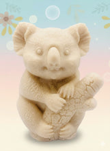 Load image into Gallery viewer, Handmade vegan soaps featuring a chunky koala bear climbing a tree packaged in beautiful eco friendly packaging crafted with natural French clays, activated charcoal and essential oils. a eco-friendly, zero waste gift that’s cruelty-free, skin-nourishing, and perfect for koala bear lovers and animal themed gifts. small business UK