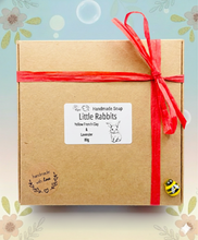 Load image into Gallery viewer, Handmade vegan soaps featuring a set of two detailed rabbit soaps, beautifully gift boxed in eco friendly packaging. crafted with natural French clays, activated charcoal and essential oils. a eco-friendly, zero waste gift that’s cruelty-free, skin-nourishing, and perfect for rabbit owners gifts and Mother’s Day. Small business UK