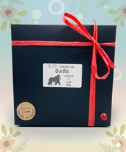 Load image into Gallery viewer, Handmade vegan soaps featuring a huge detailed gorilla soap gift boxed in beautiful eco friendly packaging crafted with natural French clays, activated charcoal and essential oils. a eco-friendly, zero waste gift that’s cruelty-free, skin-nourishing, and perfect for gorilla lovers, gifts for him and animal themed gifts. small business UK
