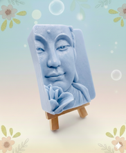 Load image into Gallery viewer, Handmade vegan soaps featuring a beautiful buddha and lotus flower and wrapped in beautiful eco friendly packaging crafted with natural French clays, activated charcoal and essential oils. a eco-friendly, zero waste gift that’s cruelty-free, skin-nourishing, and perfect gift for buddha lovers. small business UK