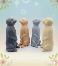 Load image into Gallery viewer, Looking for a little companion to keep an eye on things in the bathroom? Our cheeky Meerkat vegan soap is here and ready for duty! Handmade with love, this charming fellow is much more than just a novelty…. he’s a skin-loving treat designed to bring a smile to your morning routine.
#meerkat #simples #animals #handmadesoap #smallbusinessuk