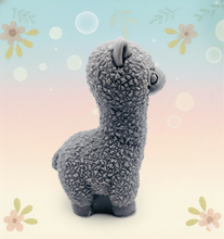 Load image into Gallery viewer, Handmade vegan soap featuring a cute detailed alpaca / llama. crafted with natural French clays, activated charcoal and essential oils. a eco-friendly, zero waste gift that’s cruelty-free, skin-nourishing, and perfect for animal lovers and llama alpaca lovers. Small Business UK