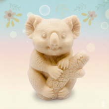 Load image into Gallery viewer, Handmade vegan soaps featuring a chunky koala bear climbing a tree packaged in beautiful eco friendly packaging crafted with natural French clays, activated charcoal and essential oils. a eco-friendly, zero waste gift that’s cruelty-free, skin-nourishing, and perfect for koala bear lovers and animal themed gifts. small business UK