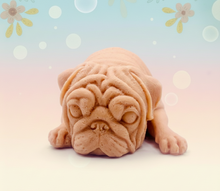 Load image into Gallery viewer, Handmade vegan soap featuring sleepy pug lying down and packed in beautiful eco friendly packaging. crafted with natural French clays, activated charcoal and essential oils. a eco-friendly, zero waste gift that’s cruelty-free, skin-nourishing, and perfect for pug owners, dog lovers or animal themed gifts. Small business UK