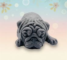 Load image into Gallery viewer, Handmade vegan soap featuring sleepy pug lying down and packed in beautiful eco friendly packaging. crafted with natural French clays, activated charcoal and essential oils. a eco-friendly, zero waste gift that’s cruelty-free, skin-nourishing, and perfect for pug owners, dog lovers or animal themed gifts. Small business UK