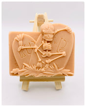 Load image into Gallery viewer, Handmade vegan soaps featuring a skeleton dancing on his RIP grave. crafted with natural French clays, activated charcoal and essential oils. a eco-friendly, zero waste gift that’s cruelty-free, skin-nourishing, and perfect for skull lovers and Halloween gifting . Small business UK