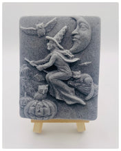 Load image into Gallery viewer, Handmade vegan soaps featuring a witch flying on her broomstick. crafted with natural French clays, activated charcoal and essential oils. a eco-friendly, zero waste gift thatās cruelty-free, skin-nourishing, and perfect for witch gifts and Halloween gifts. Small business UK