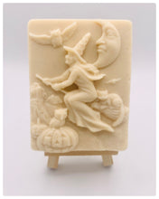 Load image into Gallery viewer, Handmade vegan soaps featuring a witch flying on her broomstick. crafted with natural French clays, activated charcoal and essential oils. a eco-friendly, zero waste gift thatās cruelty-free, skin-nourishing, and perfect for witch gifts and Halloween gifts. Small business UK