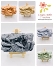 Load image into Gallery viewer, Dinosaur Gift | dinosaur Lover Gift | dragon Lover Gift | alternative Gift | Dinosaur Vegan Soap This incredible dinosaur soap is the perfect gift for any dinosaur or mystical creatures fan! All soaps are handmade fresh to order,, vegan, cruelty free and available in your choice of colour and essential oil All our soaps are made with natural clays and essential oils to gently cleanse and nourish your skin. Plus, they come in eco-friendly packaging so you can feel good about your purchase and the environment