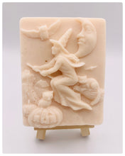 Load image into Gallery viewer, Handmade vegan soaps featuring a witch flying on her broomstick. crafted with natural French clays, activated charcoal and essential oils. a eco-friendly, zero waste gift thatās cruelty-free, skin-nourishing, and perfect for witch gifts and Halloween gifts. Small business UK