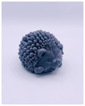 Load image into Gallery viewer, Handmade vegan soaps featuring a cute waving hedgehog, packaged in beautiful eco friendly packaging. crafted with natural French clays, activated charcoal and essential oils. a eco-friendly, zero waste gift that’s cruelty-free, skin-nourishing, the perfect gift for hedgehog lovers and animal lovers. small business UK