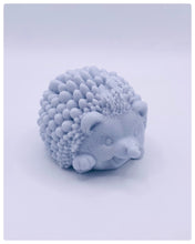 Load image into Gallery viewer, Handmade vegan soaps featuring a cute waving hedgehog, packaged in beautiful eco friendly packaging. crafted with natural French clays, activated charcoal and essential oils. a eco-friendly, zero waste gift that’s cruelty-free, skin-nourishing, the perfect gift for hedgehog lovers and animal lovers. small business UK