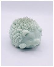 Load image into Gallery viewer, Handmade vegan soaps featuring a cute waving hedgehog, packaged in beautiful eco friendly packaging. crafted with natural French clays, activated charcoal and essential oils. a eco-friendly, zero waste gift that’s cruelty-free, skin-nourishing, the perfect gift for hedgehog lovers and animal lovers. small business UK