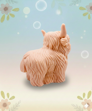 Load image into Gallery viewer, Handmade vegan soaps featuring a large detailed highland cow. crafted with natural French clays, activated charcoal and essential oils. a eco-friendly, zero waste gift that’s cruelty-free, skin-nourishing, and perfect for highland coo lovers and animal themed gifts. small business UK