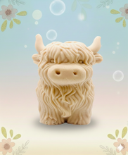 Load image into Gallery viewer, Handmade vegan soaps featuring a large detailed highland cow. crafted with natural French clays, activated charcoal and essential oils. a eco-friendly, zero waste gift that’s cruelty-free, skin-nourishing, and perfect for highland coo lovers and animal themed gifts. small business UK