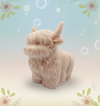 Load image into Gallery viewer, Handmade vegan soaps featuring a large detailed highland cow. crafted with natural French clays, activated charcoal and essential oils. a eco-friendly, zero waste gift that’s cruelty-free, skin-nourishing, and perfect for highland coo lovers and animal themed gifts. small business UK