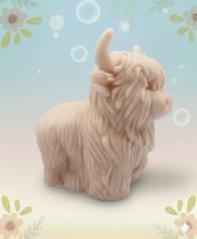 Load image into Gallery viewer, Handmade vegan soaps featuring a large detailed highland cow. crafted with natural French clays, activated charcoal and essential oils. a eco-friendly, zero waste gift that’s cruelty-free, skin-nourishing, and perfect for highland coo lovers and animal themed gifts. small business UK