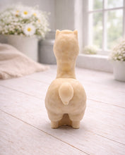 Load image into Gallery viewer, handmade vegan soap in the shape of a realistic standing alpaca or llama sculpture, featuring a smooth body with detailed fur texture on the head and neck, displayed in a bright farmhouse decor setting.