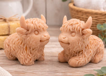 Load image into Gallery viewer, A pair of highly detailed handmade vegan Highland cow soaps by Soap Simple Creations. Set of two cow soaps gift boxed in ea eco friendly packaging.