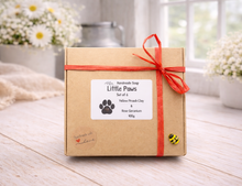 Load image into Gallery viewer, Handmade soap set packaging with a red ribbon on a wooden surface