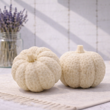 Load image into Gallery viewer, Two pumpkin vegan soaps / gift set on a rug with a vase of lavender in the background.