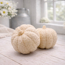 Load image into Gallery viewer, handmade vegan soaps in the shape of realistic chunky pumpkins, featuring detailed bumpy skin texture and stems, displayed on a rustic white wooden surface in a bright farmhouse decor setting.