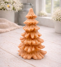Load image into Gallery viewer, vegan soap sculpted into a realistic evergreen Christmas tree with multiple layers of textured, needle-like branches, with a subtle snow-dusted effect.