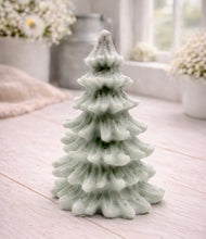 Load image into Gallery viewer, vegan soap sculpted into a realistic evergreen Christmas tree with multiple layers of textured, needle-like branches, with a subtle snow-dusted effect.