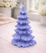 Load image into Gallery viewer, vegan soap sculpted into a realistic evergreen Christmas tree with multiple layers of textured, needle-like branches, with a subtle snow-dusted effect.