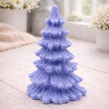 Load image into Gallery viewer, vegan soap sculpted into a realistic evergreen Christmas tree with multiple layers of textured, needle-like branches, with a subtle snow-dusted effect.