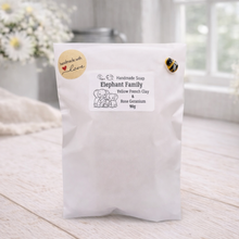 Load image into Gallery viewer, White package with branding on a light wooden surface