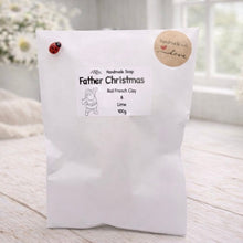 Load image into Gallery viewer, White soap package with 'Father Christmas' branding on a light wooden surface.