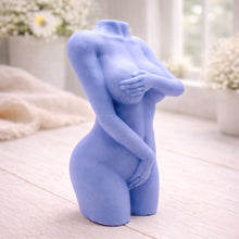 Load image into Gallery viewer, A 3D handmade vegan soap sculpted into a detailed female torso with soft, realistic curves and defined musculature and displayed in a bright farmhouse setting.