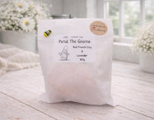 Load image into Gallery viewer, White bag labeled 'Petal The Gnome' with a gnome illustration on a light wooden surface.