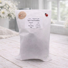 Load image into Gallery viewer, White bag labeled 'Spiritual Buddha' on a light wooden surface with a blurred background
