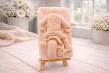 Load image into Gallery viewer, detailed handmade vegan soap gift featuring a motorcycle rider with a skull emblem on their jacket, displayed on a wooden easel against a whimsical farmhouse decor background