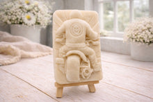 Load image into Gallery viewer, detailed handmade vegan soap gift featuring a motorcycle rider with a skull emblem on their jacket, displayed on a wooden easel against a whimsical farmhouse decor background
