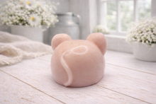 Load image into Gallery viewer, A 3D handmade vegan soap sculpted into the shape of a cute resting mouse with large rounded ears and a delicate snout, displayed on a light wooden surface in a bright farmhouse setting