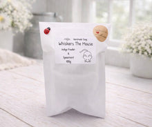 Load image into Gallery viewer, White soap packaging with 'Whiskers The Mouse' branding on a light wooden surface.